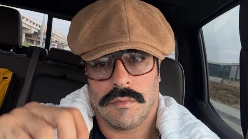 بوراک اوزچیویت در کنار گوسفندها ژست گرفت